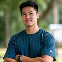 Portrait of Coach David Chen, Lead Fitness Coach at Basilic Health